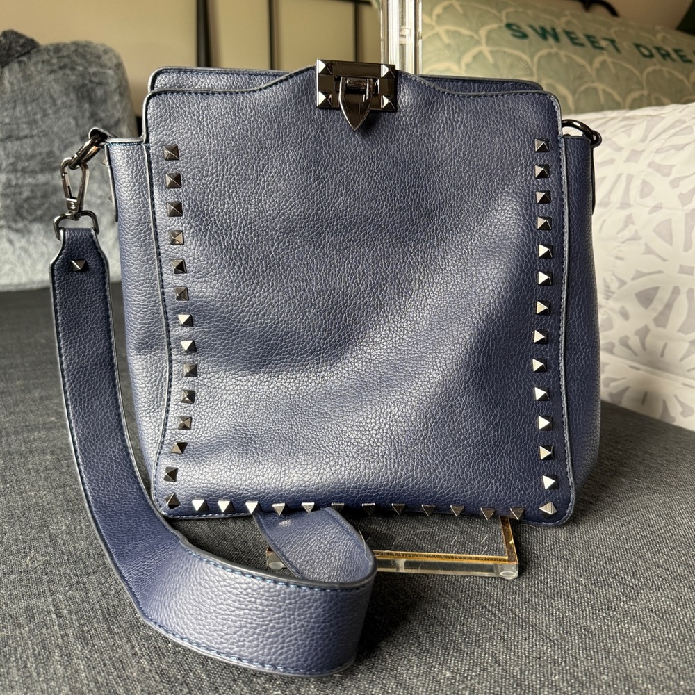 Blue leather crossbody with studs